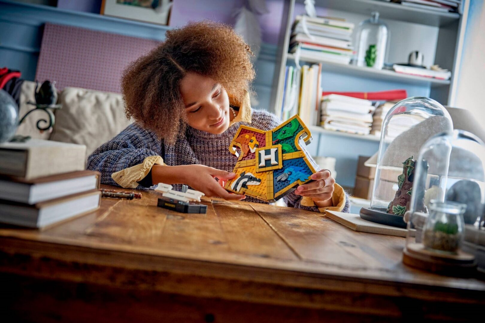 Individual focused on building a puzzle piece